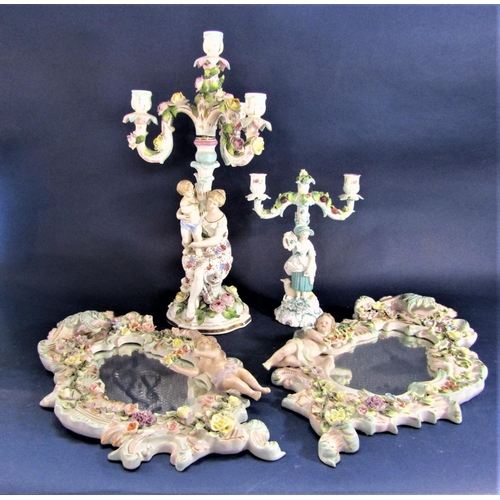 1108 - A late 19th century continental two sectional three branch candelabra with applied figure of a woman... 