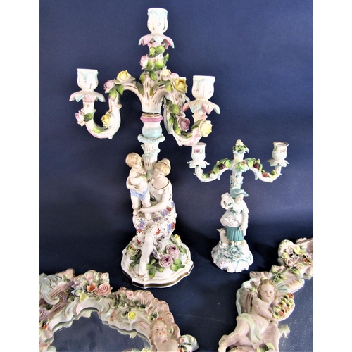 1108 - A late 19th century continental two sectional three branch candelabra with applied figure of a woman... 