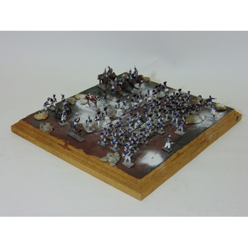 71 - Model of battle scene with Napoleonic soldiers in battle formation, featuring infantry, drummers,  c... 