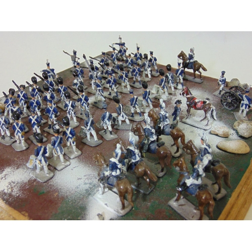 71 - Model of battle scene with Napoleonic soldiers in battle formation, featuring infantry, drummers,  c... 