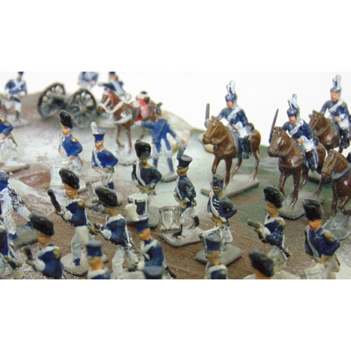 71 - Model of battle scene with Napoleonic soldiers in battle formation, featuring infantry, drummers,  c... 