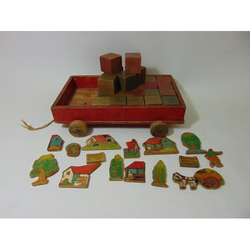 77 - Vintage wooden tow along cart with bricks, and a collection of wooden farm animal and building shape... 