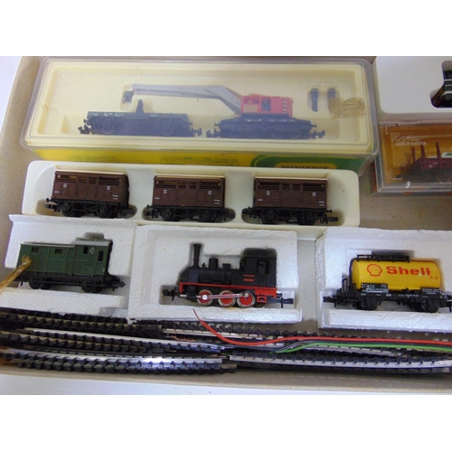 82 - Mixed toy collection including N gauge Lima Locomotive, rolling stock and a Heller track kit  togeth... 