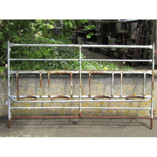 2097 - A galvanised steel plant stand with four simple ring pot receptacles and tubular framework, 107 cm h... 