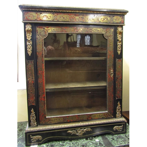 2820 - A good 19th century Boulle  pier cabinet set within an ebonised frame, the front elevation enclosed ... 