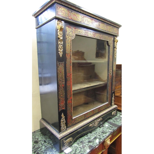 2820 - A good 19th century Boulle  pier cabinet set within an ebonised frame, the front elevation enclosed ... 