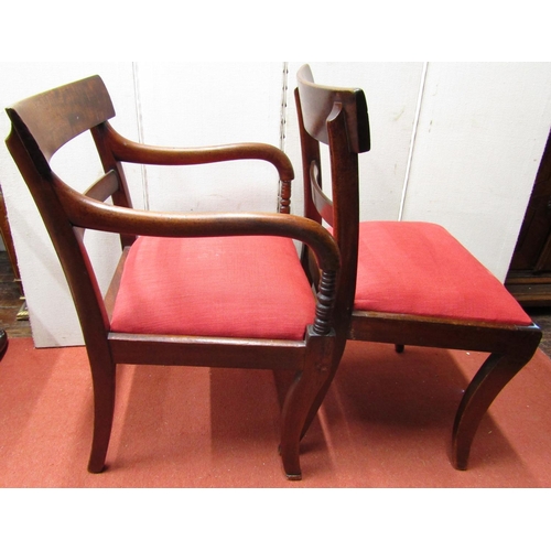 2810 - A set of Eight(6+2) late Regency mahogany sabre leg dining chairs with spade backs and drop in seats