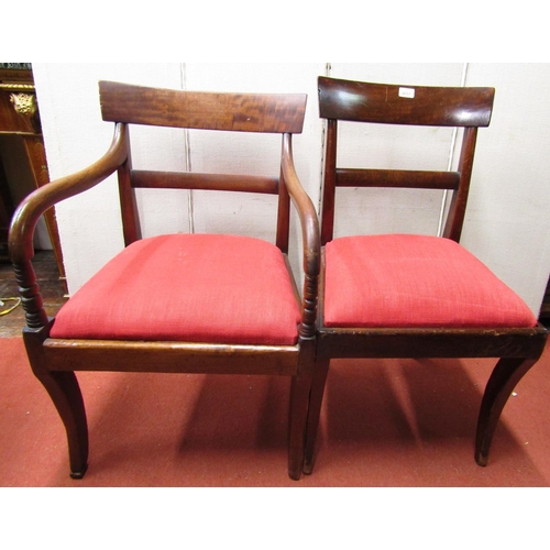 2810 - A set of Eight(6+2) late Regency mahogany sabre leg dining chairs with spade backs and drop in seats