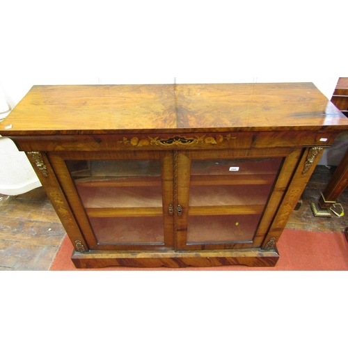 2821 - A mid Victorian period walnut side cabinet, enclosed by two glazed panelled doors, with floral marqu... 