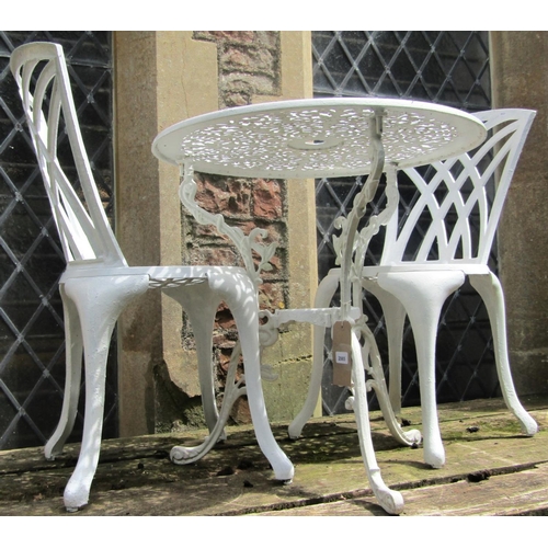 2065 - A cream painted cast aluminium garden terrace table, with decorative circular pierced top, raised on... 