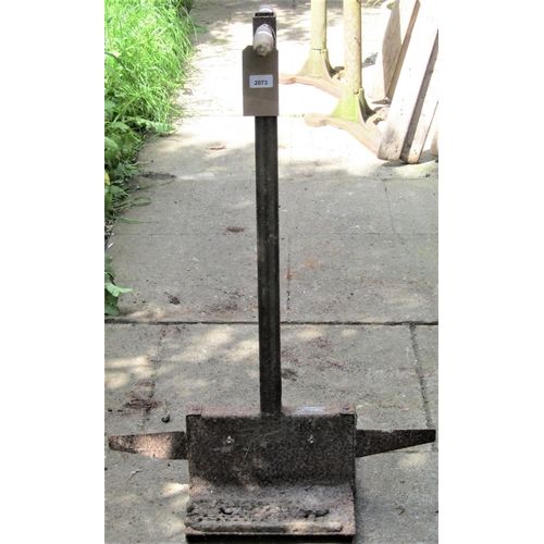 2073 - A boot scraper with square tubular shaft and platform base, with worn brushes, labelled Attissons (a... 