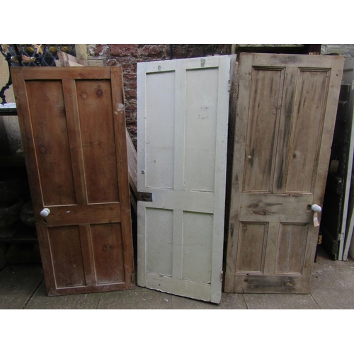 2083 - Eleven reclaimed pine doors, eight painted and three stripped, varying in size and design, mainly qu... 