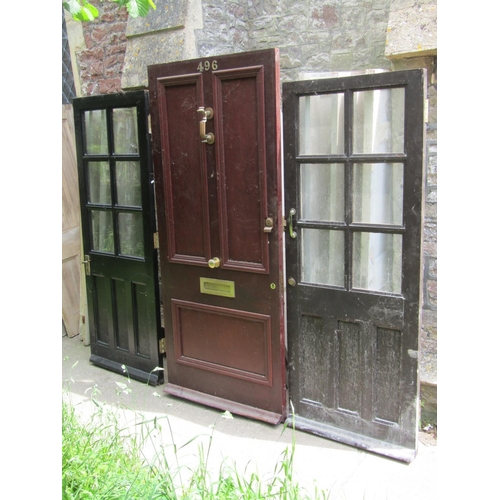 2084 - A reclaimed hardwood panelled front door, complete with brass doors knocker and fittings, 90cm wide ... 