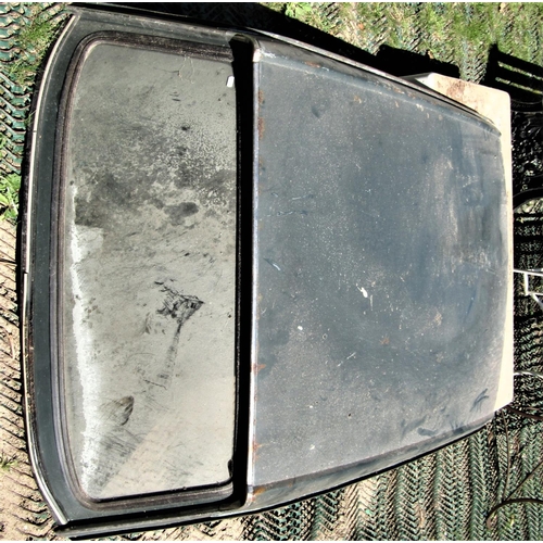 2082 - A vintage Triumph Herald car roof with combined back window (af)