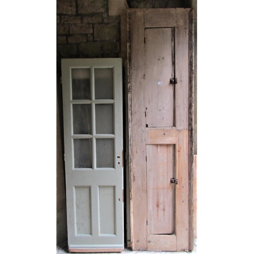 2087 - A tall reclaimed stripped pine alcove cupboard front, enclosed by two rectangular doors, 246cm high ... 