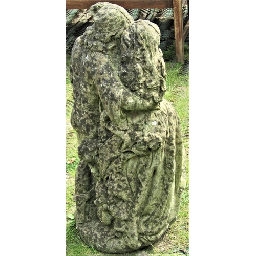 2114 - A weathered reclaimed garden ornament in the form of male and female romantic couple, 72 cm high