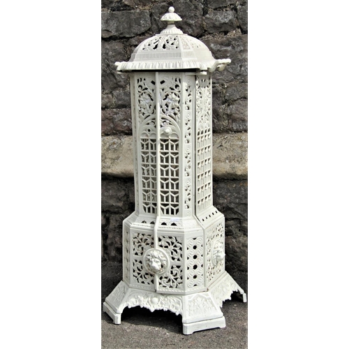 2180 - A Victorian cream painted cast iron floor standing conservatory heater with decorative pierced folia... 