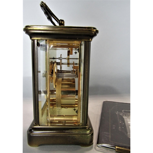 1537 - Matthew Norman of London brass cased carriage clock, 12cm high, key and papers