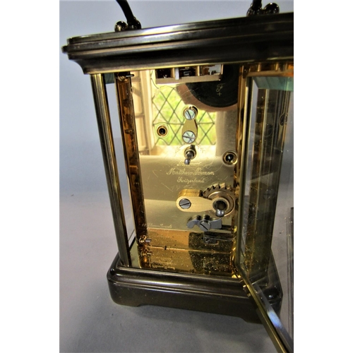 1537 - Matthew Norman of London brass cased carriage clock, 12cm high, key and papers