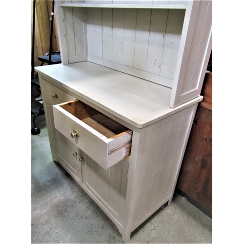 2322 - A rustic painted pine kitchen dresser with tongue and groove boarded framework, the base enclosed by... 