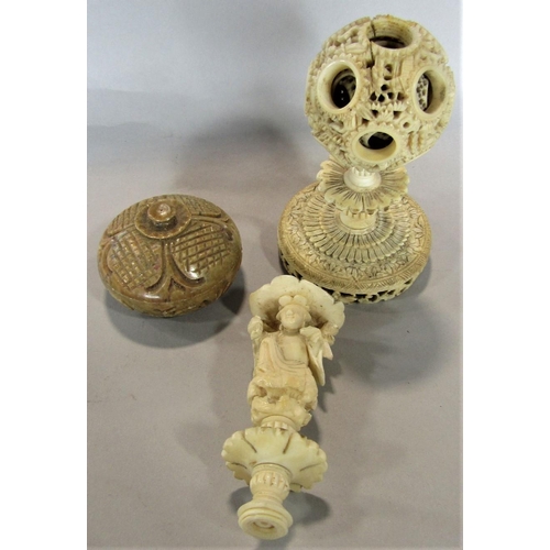 1545 - 19th century canton ivory concentric ball on stand, 10cm high, together with a further ivory figural... 