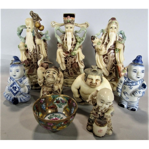 1546 - A collection of Chinese carved bone figures of immortals, each 12cm high approx; together with a fur... 