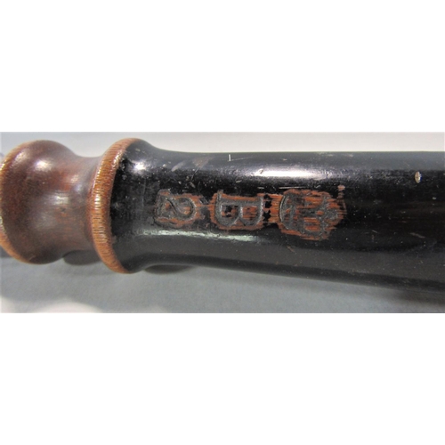 1563 - Antique ebonised police truncheon with gilt painted crown and VR number B2, 39cm long