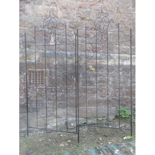 2109 - A pair of contemporary decorative light metal garden screens with scrollwork detail, 70 cm wide x 16... 