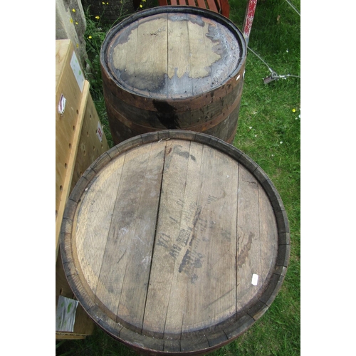 2142 - A paid of coopered oak and steel banded bourbon whiskey approx 60cm diameter x 90cm high