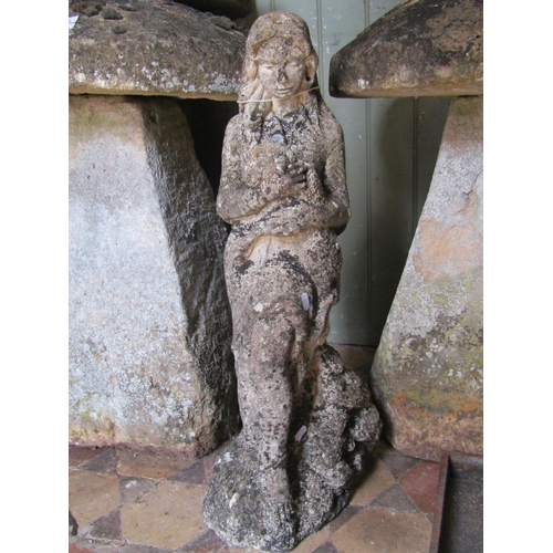 2171 - A reclaimed garden figure of a standing maiden beside a tree stump clutching a lamb, 74cm high