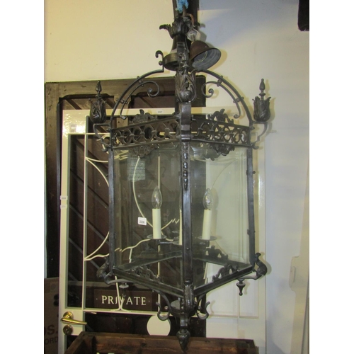 2236 - A heavy cast bronze framed country house size hanging porch lantern with acanthus leaf, scroll and p... 