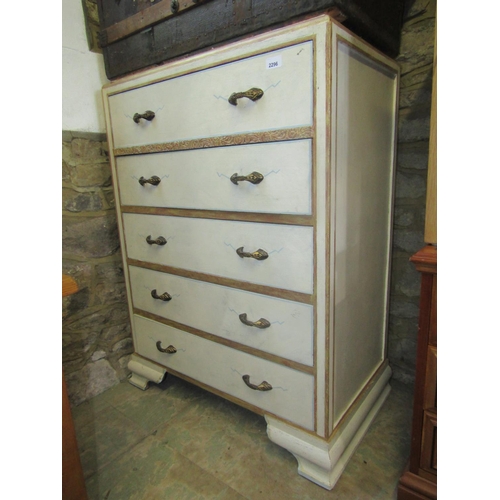 2296 - A 1930s oak framed bedroom chest of five long drawers with fixed cast loop handles and raised on oge... 