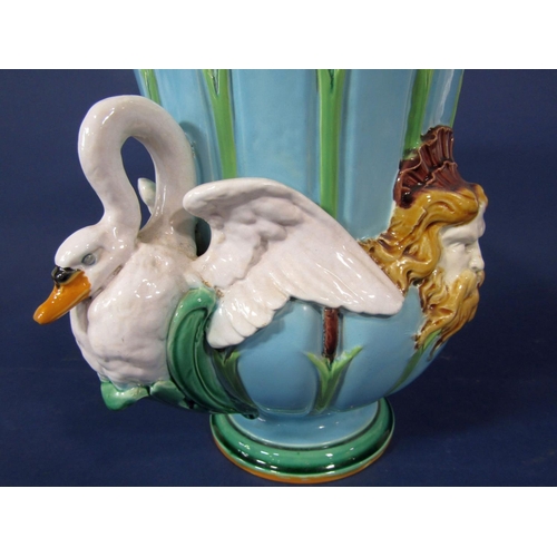 1048 - A late 19th century Minton majolica two handled vase with turquoise ground moulded swan handles and ... 