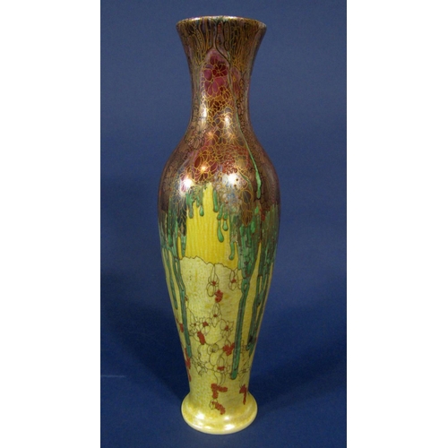 1068 - A good quality Wilkinson pottery Tibetan vase of elongated ovoid form with painted and gilded stylis... 