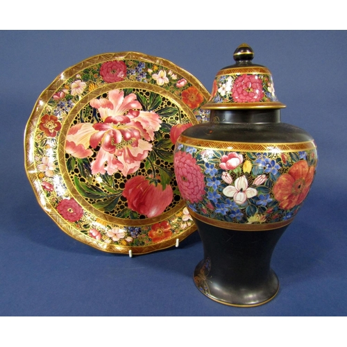 1070 - A Wilkinson pottery Rubaiyat ware charger with iris, tulip and other floral decoration to centre pan... 