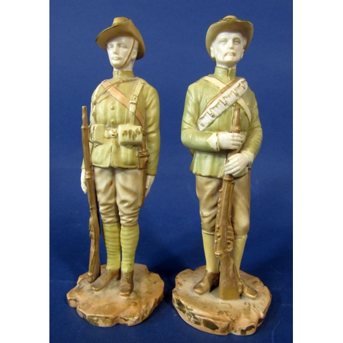 1072 - A pair of Royal Worcester Boer War series figures decorated in pale green and gilt, one showing The ... 