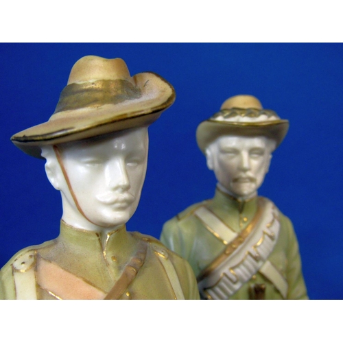 1072 - A pair of Royal Worcester Boer War series figures decorated in pale green and gilt, one showing The ... 