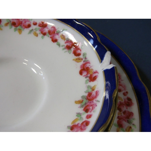 1082 - A collection of Hammersley China teawares with rose border decoration comprising a pair of cake plat... 