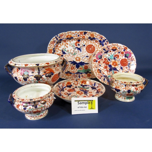 1084 - An extensive collection of 19th century ironstone china dinnerwares with red, blue and gilt chinoise... 