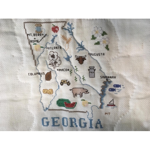 1594 - Large quilt, incorporating 12 cross stitched pictorial panels featuring map of the State of Georgia ... 