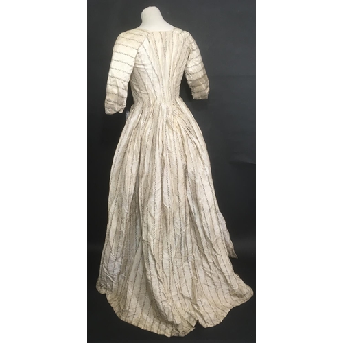 1600 - 18th century overdress for evening or promenade, 1770's, in brocaded ivory silk lined with fine line... 