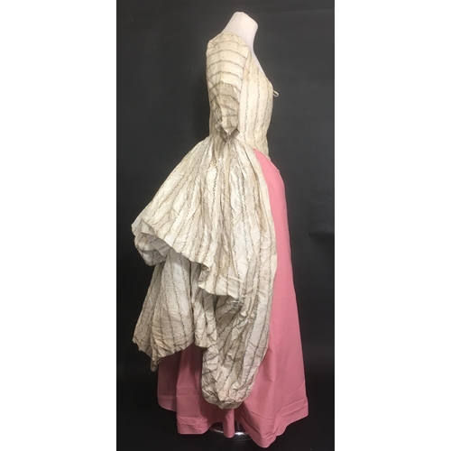 1600 - 18th century overdress for evening or promenade, 1770's, in brocaded ivory silk lined with fine line... 