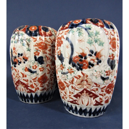 1119 - Pair of late 19th century Imari vases of fluted form, 24 cm tall approximately