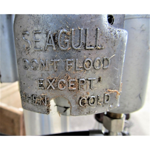 2229 - A British cased Silver Seagull vintage outboard motor (AF)