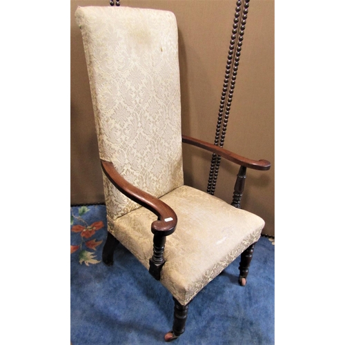 2284 - A Windsor elm and beechwood lathe back arm chair with wide generous saddle shaped seat raised on spl... 