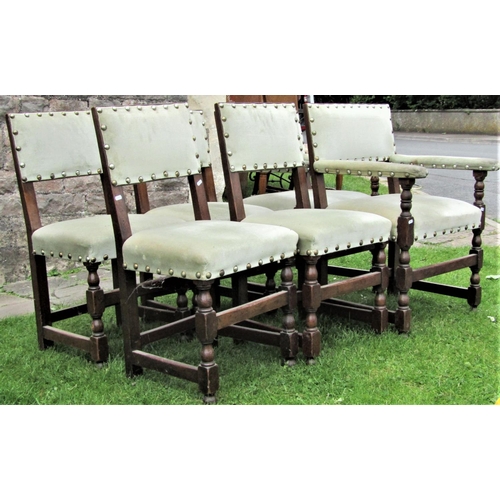 2285 - A set of six (4&2) reproduction Cromwellian style oak framed dining chairs with upholstered seats an... 