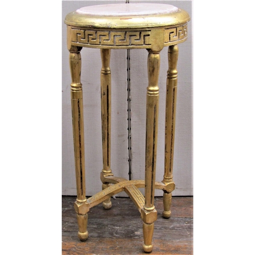 2775 - A circular jardinière stand with gilded finish, inset marble top and fluted support, 78cm high