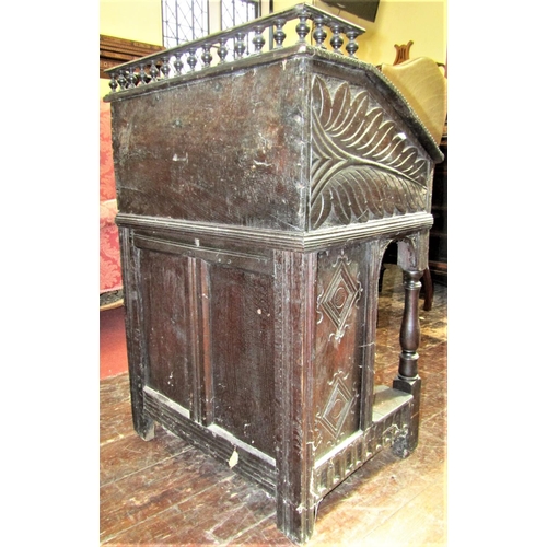 2792 - An Old English oak writing desk, the sloping lid monogrammed and dated 1646, set beneath a turned sp... 