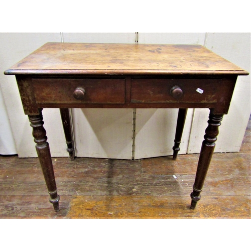 2833 - A small mid-Victorian mahogany side table with two frieze drawers on turned supports, 80cm wide