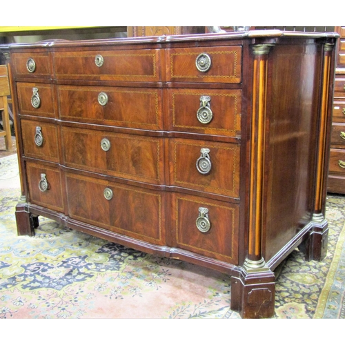 2841 - An 18th century Dutch commode of four long graduated drawers, with shaped front within fluted column... 